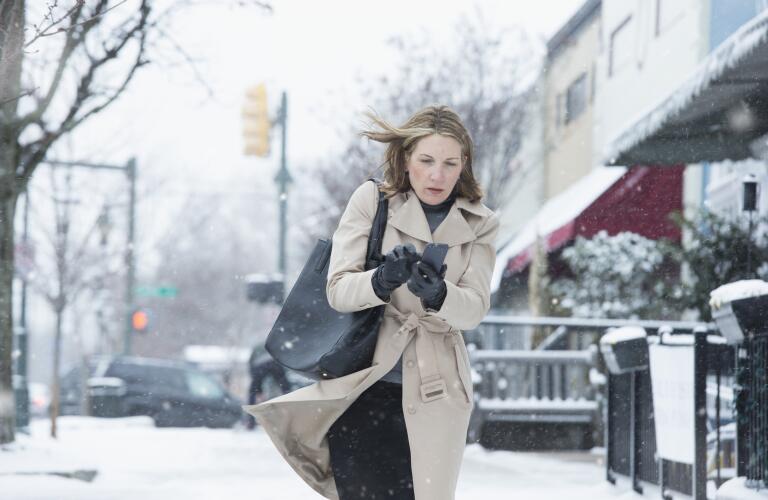 woman-walking-in-snowy-weather