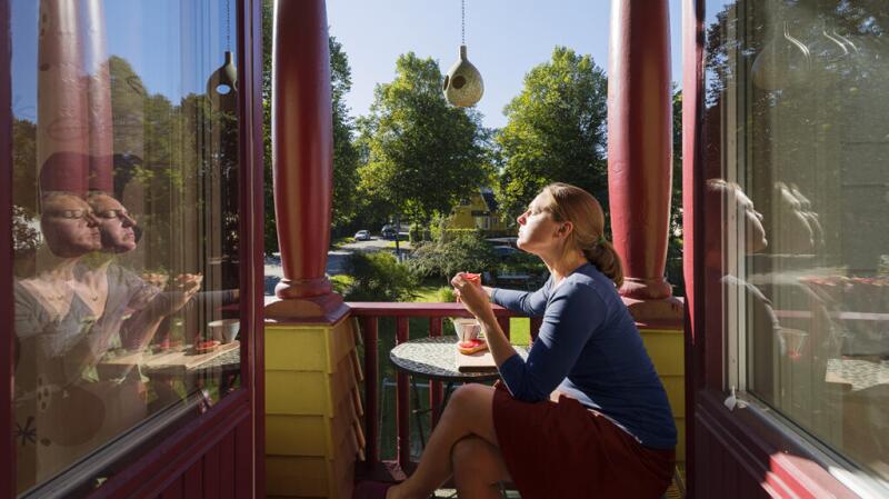 Female sitting on a patio in the sunshine