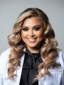 Photo: Dr. Elly Pourasef, AuD