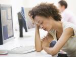 Woman in computer room sleeping