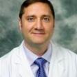 Dr. Charles Asta, MD