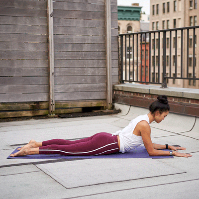 a person is performing sphinx pose