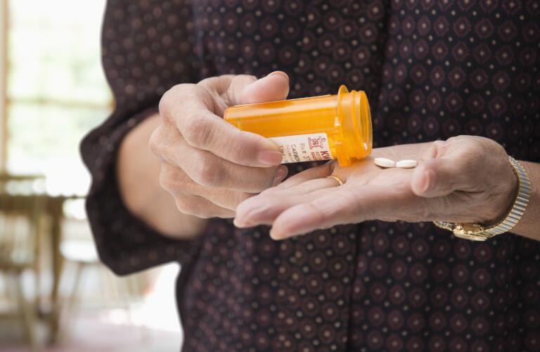 prescription-medication-woman-taking-pills