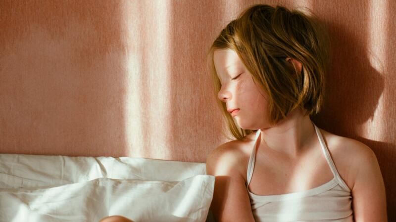 tired young girl at home
