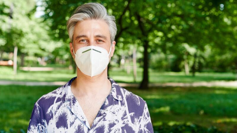 Man wearing a N95 face covering