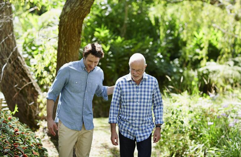 Father, son walking