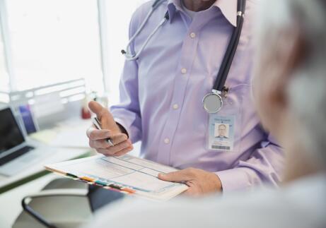 doctor-giving-diagnosis-to-patient