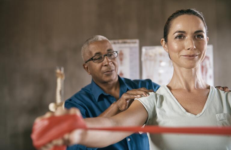 physical therapist with patient