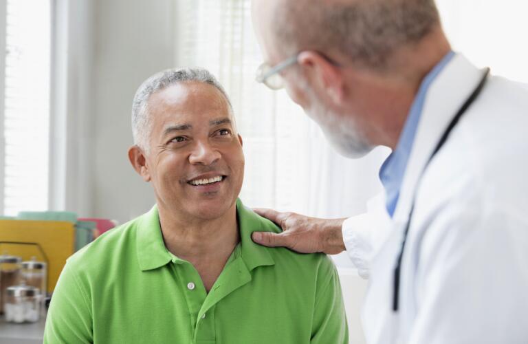 doctor talking to patient