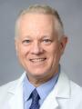 Dr. Watson John, MD