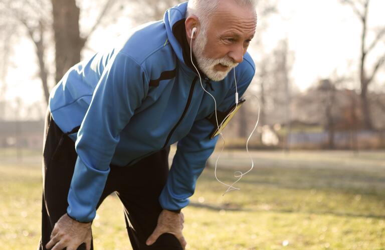 Older man out of breath while running