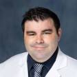 Dr. Dustin Conrad, MD
