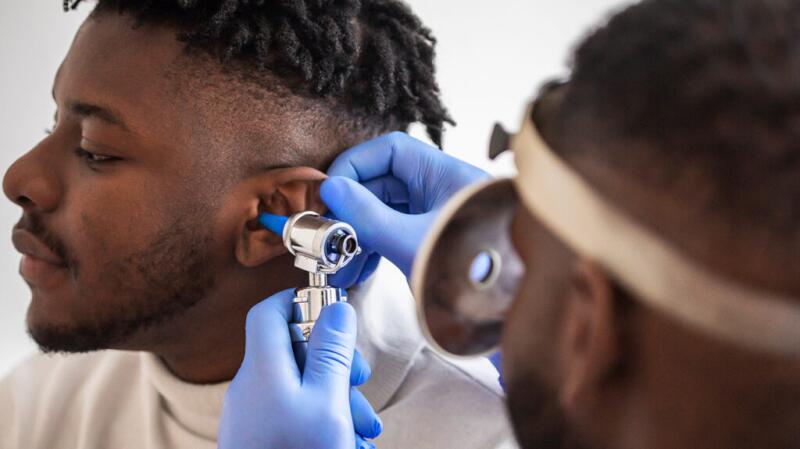 A person is having an ear checkup.