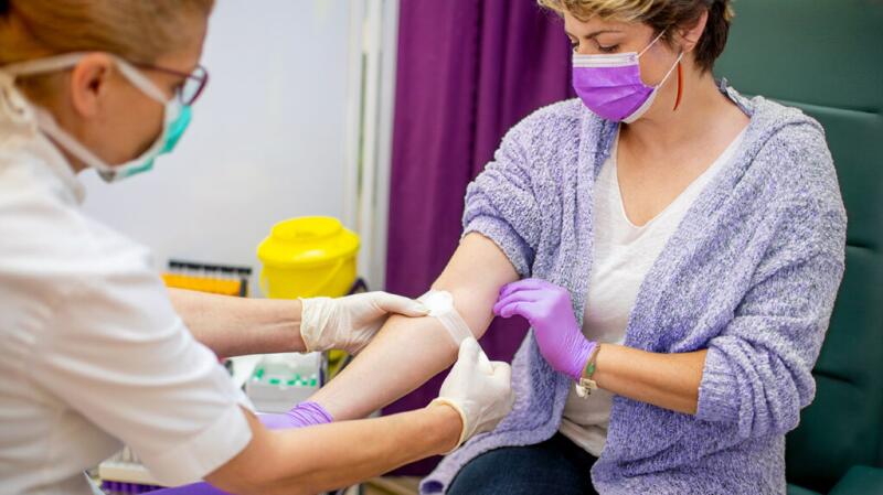 Woman getting blood taken for testing