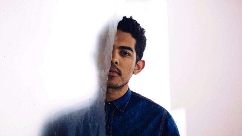 man with half of face covered