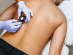 hg-male-back-skin-examination-1200x628-facebook.jpg