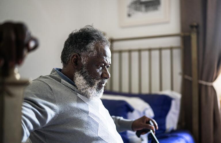 hg-man-sitting-with-cane-732x549-thumbnail.jpg