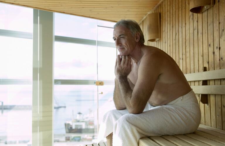 Man sitting in sauna