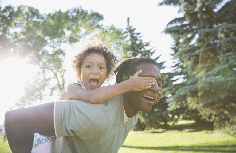 Dad, daughter at play