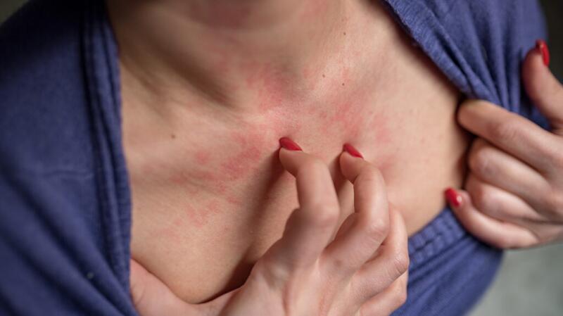 Women scratch the itch with hand