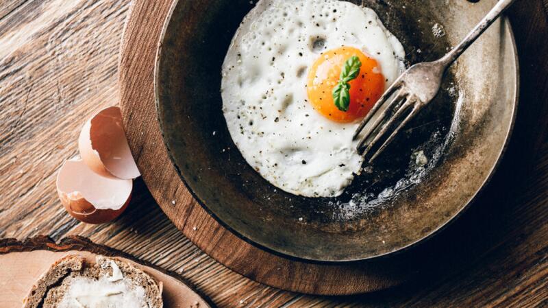 There is a fried egg in a bowl.
