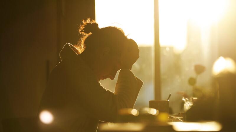 A woman looking tired