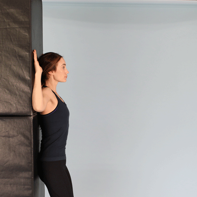 a person is performing a wall arm slide