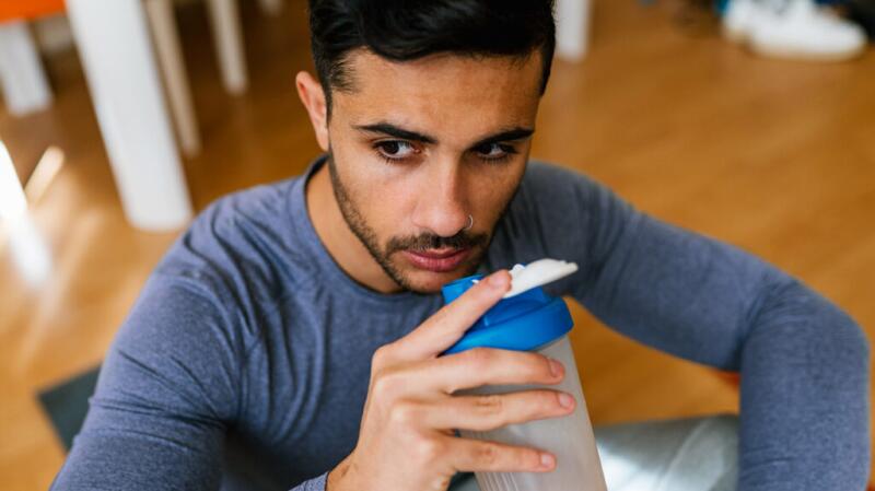 Person drinking protein shake