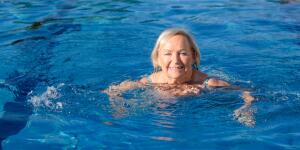 Senior woman swimming