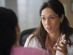 Female doctor talking to a patient