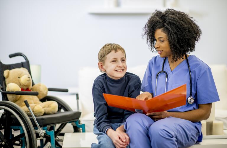 boy-sitting-with-doctor