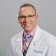 Photo: Dr. John Dock, AuD