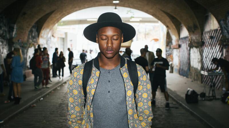 man with closed eyes in a tunnel