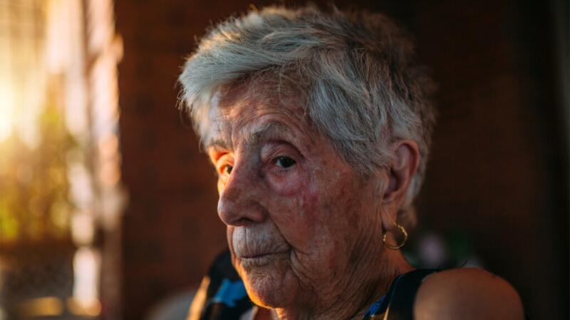 Older woman looking concerned