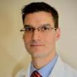 Dr. Christopher Arett, MD