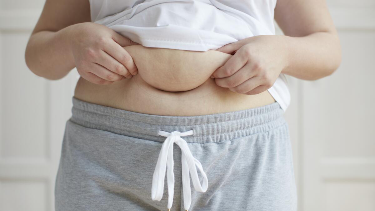 Why Belly Fat Is Harder To Lose After Menopause