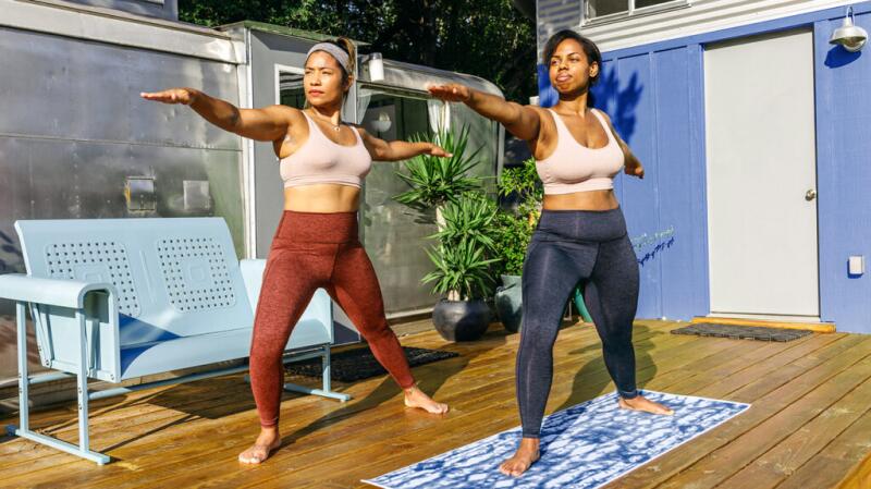 Two people exercising in the sun