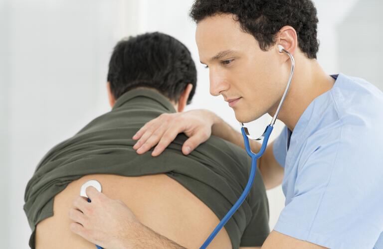 Doctor Listening The Patient's Lungs