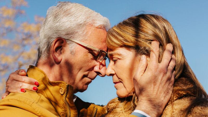 Older couple embracing