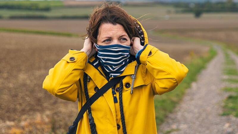 Woman wearing a neck gaiter