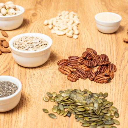 Adding nuts and seeds to your diet can reduce the risk of heart disease, but how, and which nuts and seeds should you eat? Get a list of 10 healthy nuts and seeds.