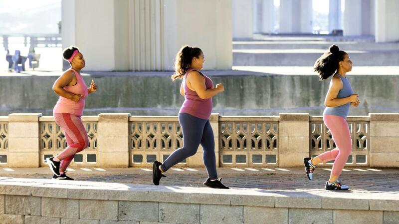 A group of adults jogging together