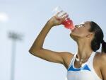 Woman drinking sports drink