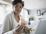 prescription-medication-woman-with-pill-bottle