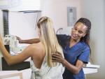 Woman undergoing a mammogram