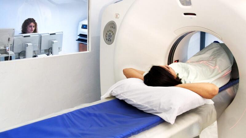 Person going through a CT scan