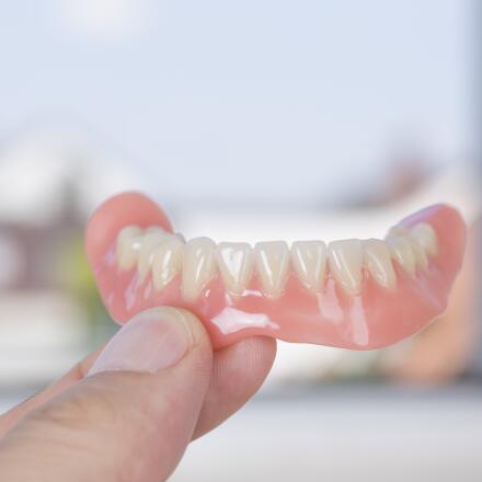 If you're a candidate for artificial teeth, here's what to know about your options.
