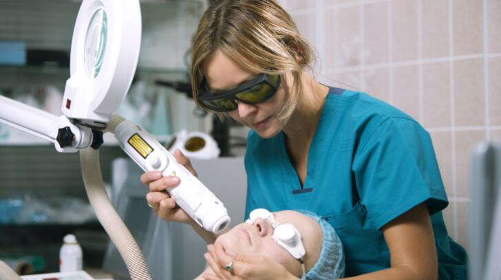 Woman Undergoing Laser Skin Treatment