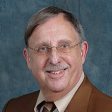 Dr. John Caras, MD