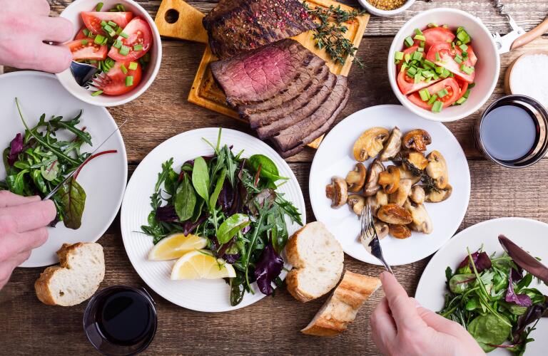 Overhead view of healthy food with salad, lean meat and vegetables